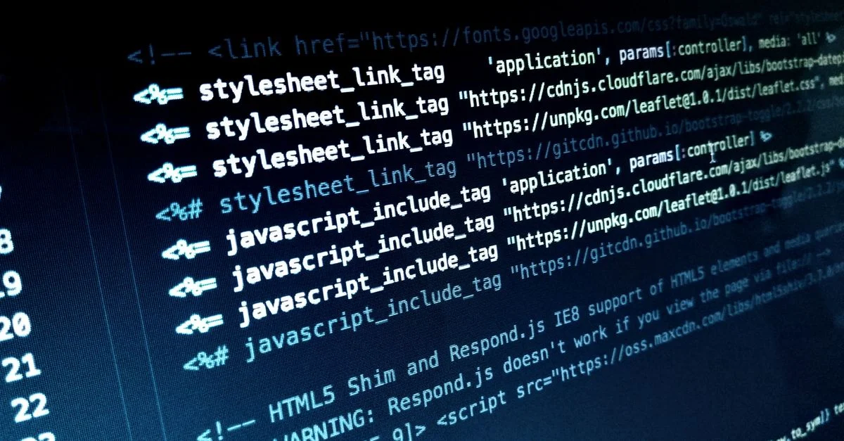 Vue détaillée du code HTML et JavaScript affiché sur un écran d'ordinateur.